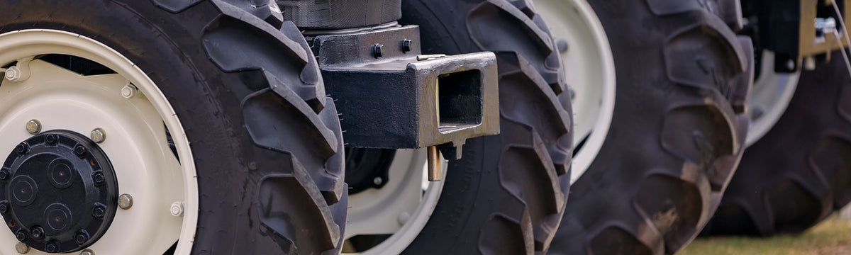 Row of tractor wheels — Melco tyre tools for agricultural vehicles